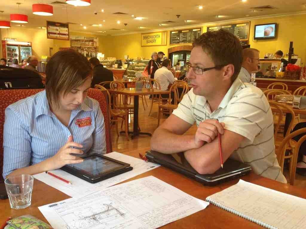 Beechworth Bakery Staff ouring over sales numbers