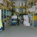 men working in a warehouse unit
