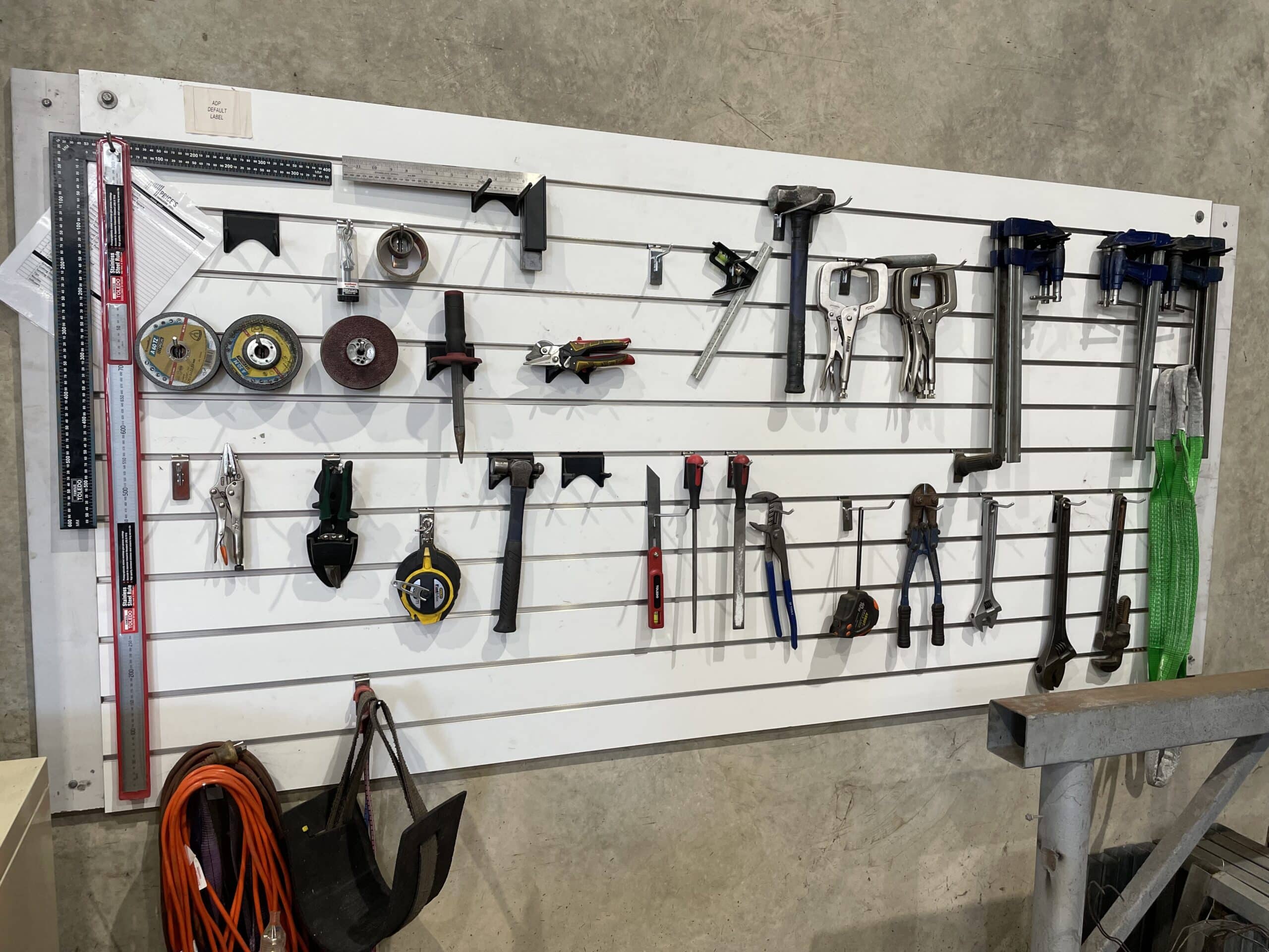 tools organised hung on a wall